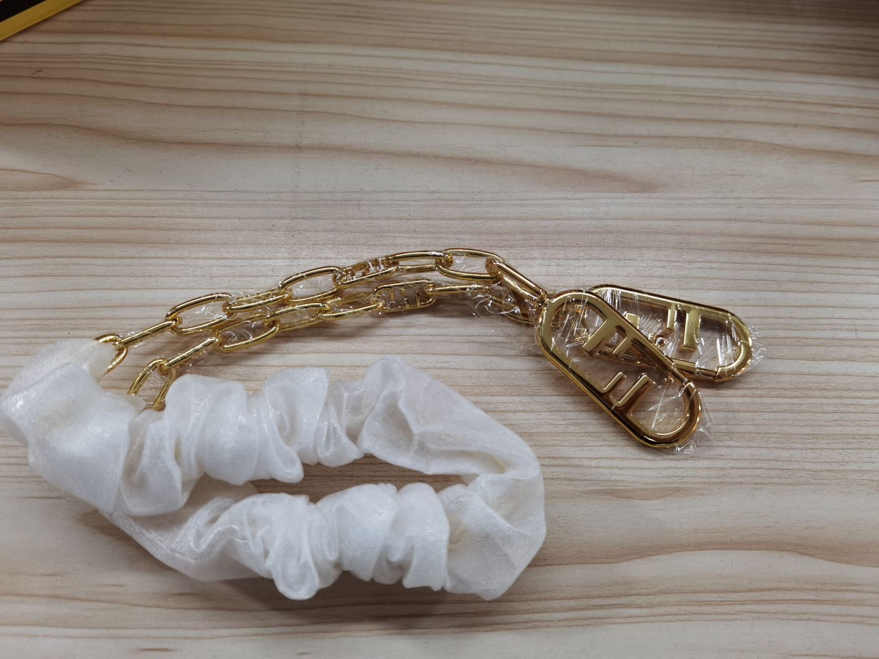 F**di gold chain