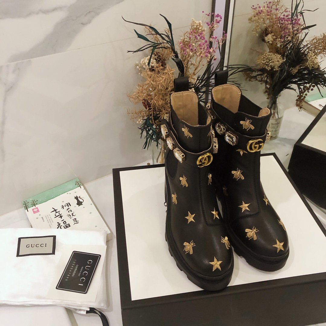 G*u*i boots