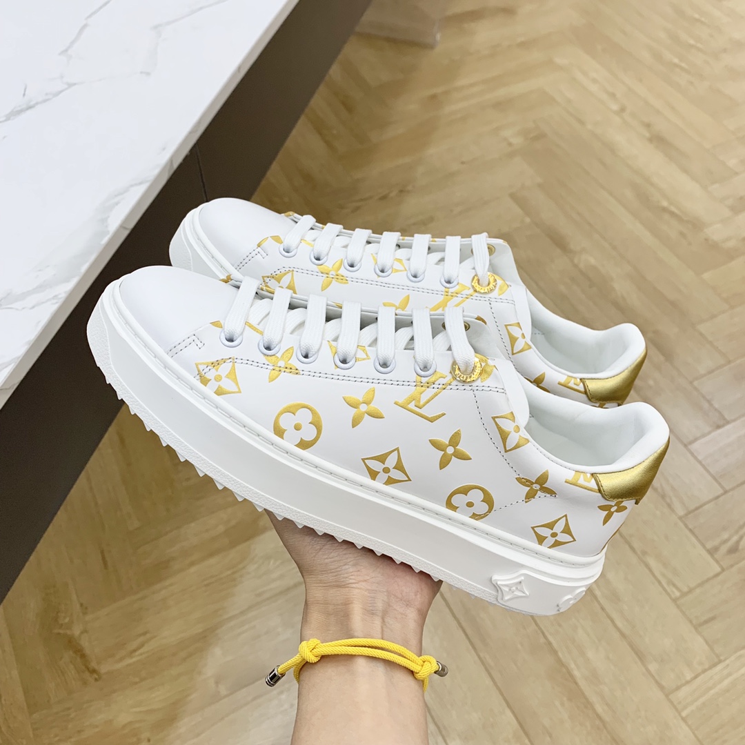 l0*is V*t0n low-top sneakers