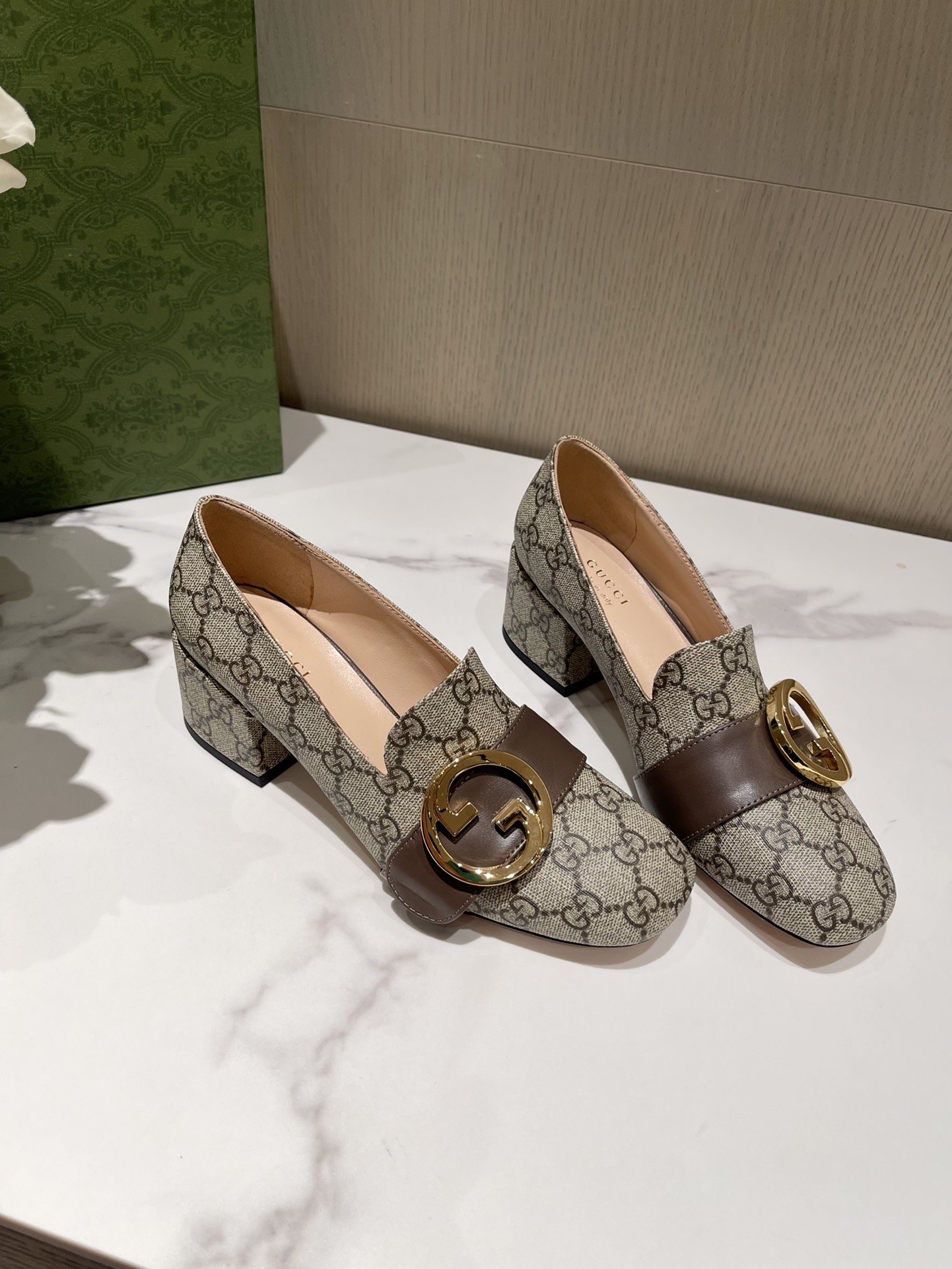 G*u*i loafers