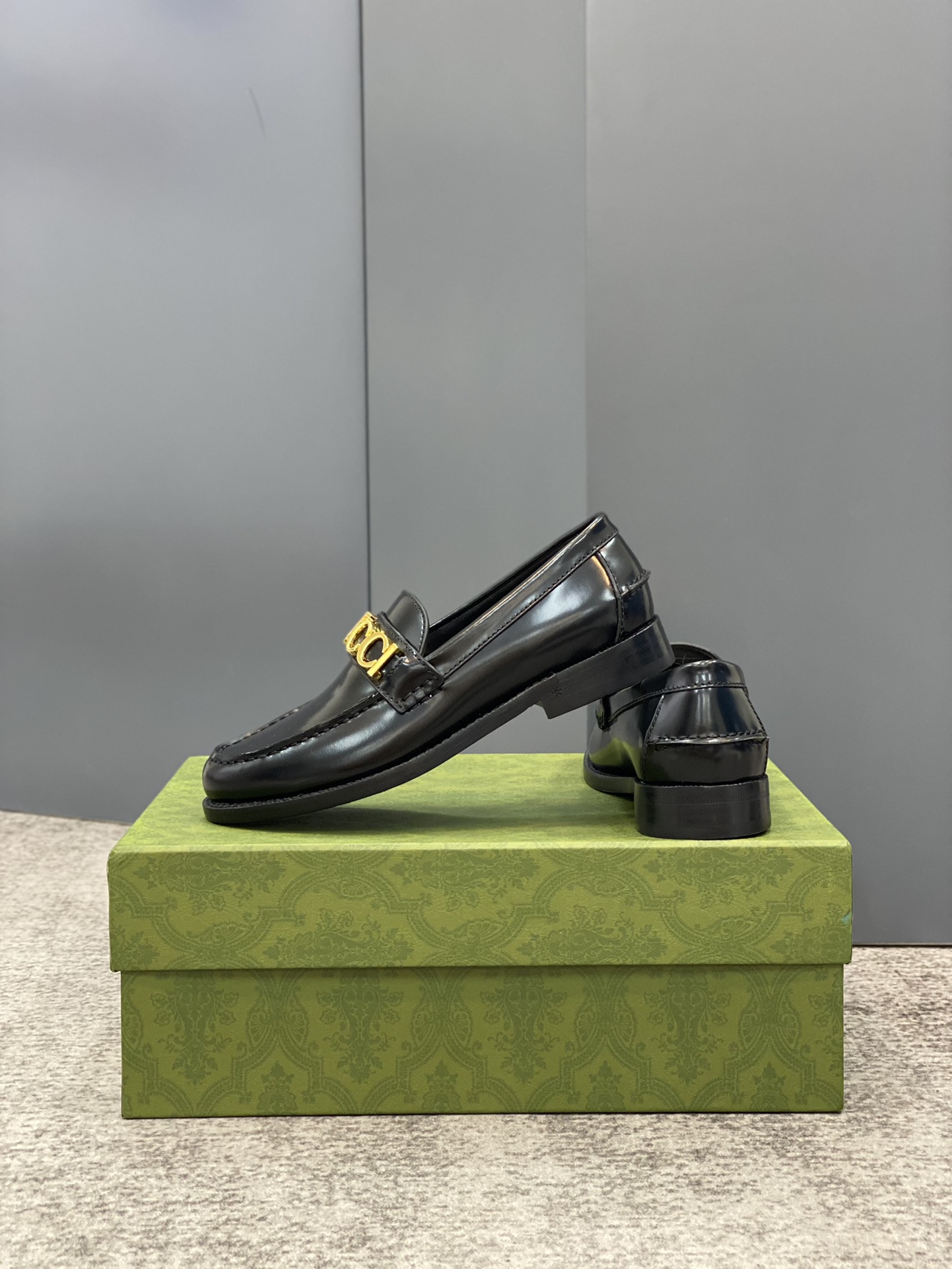 G*u*i loafers