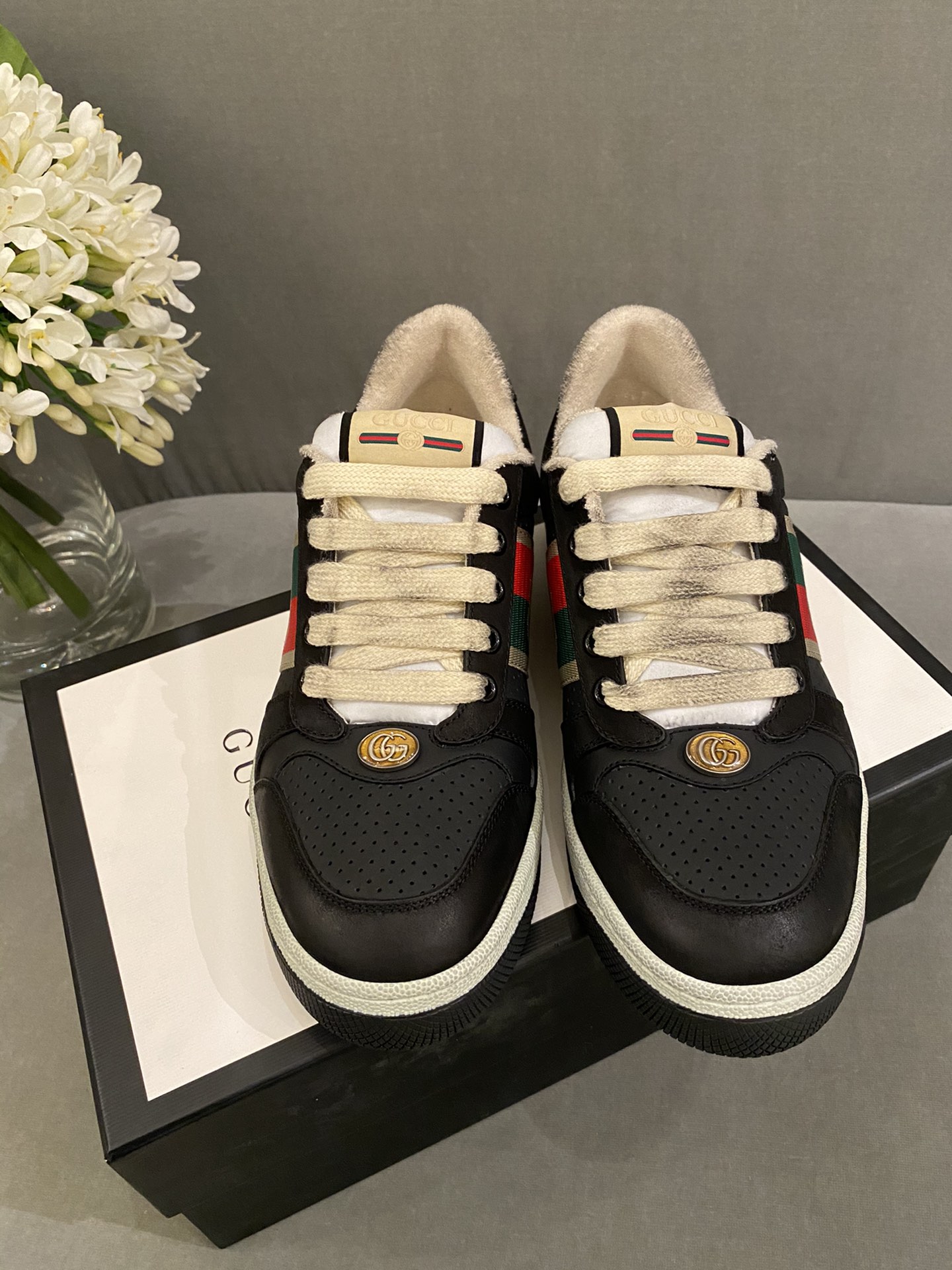 G*u*i sneakers