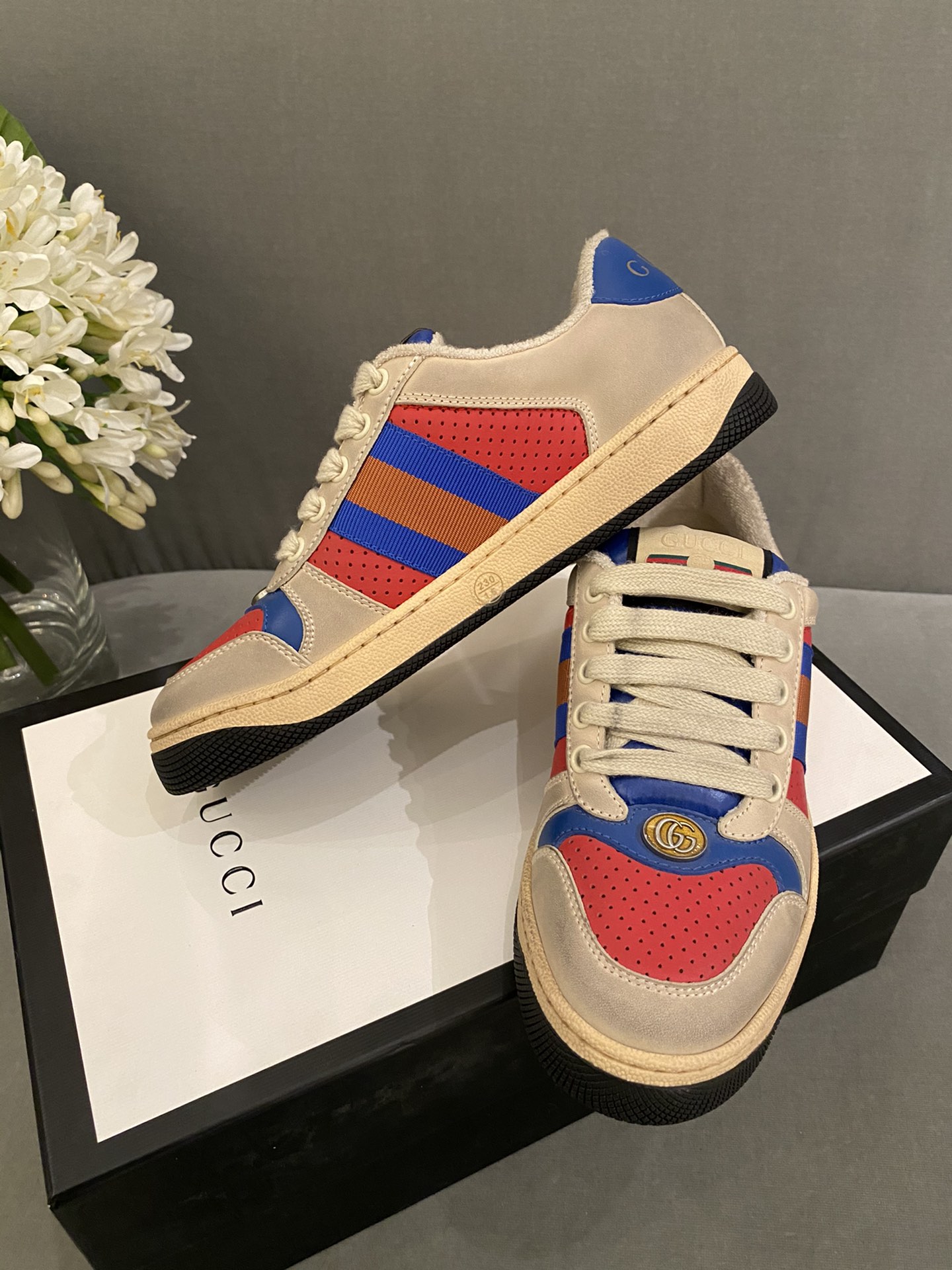 G*u*i sneakers