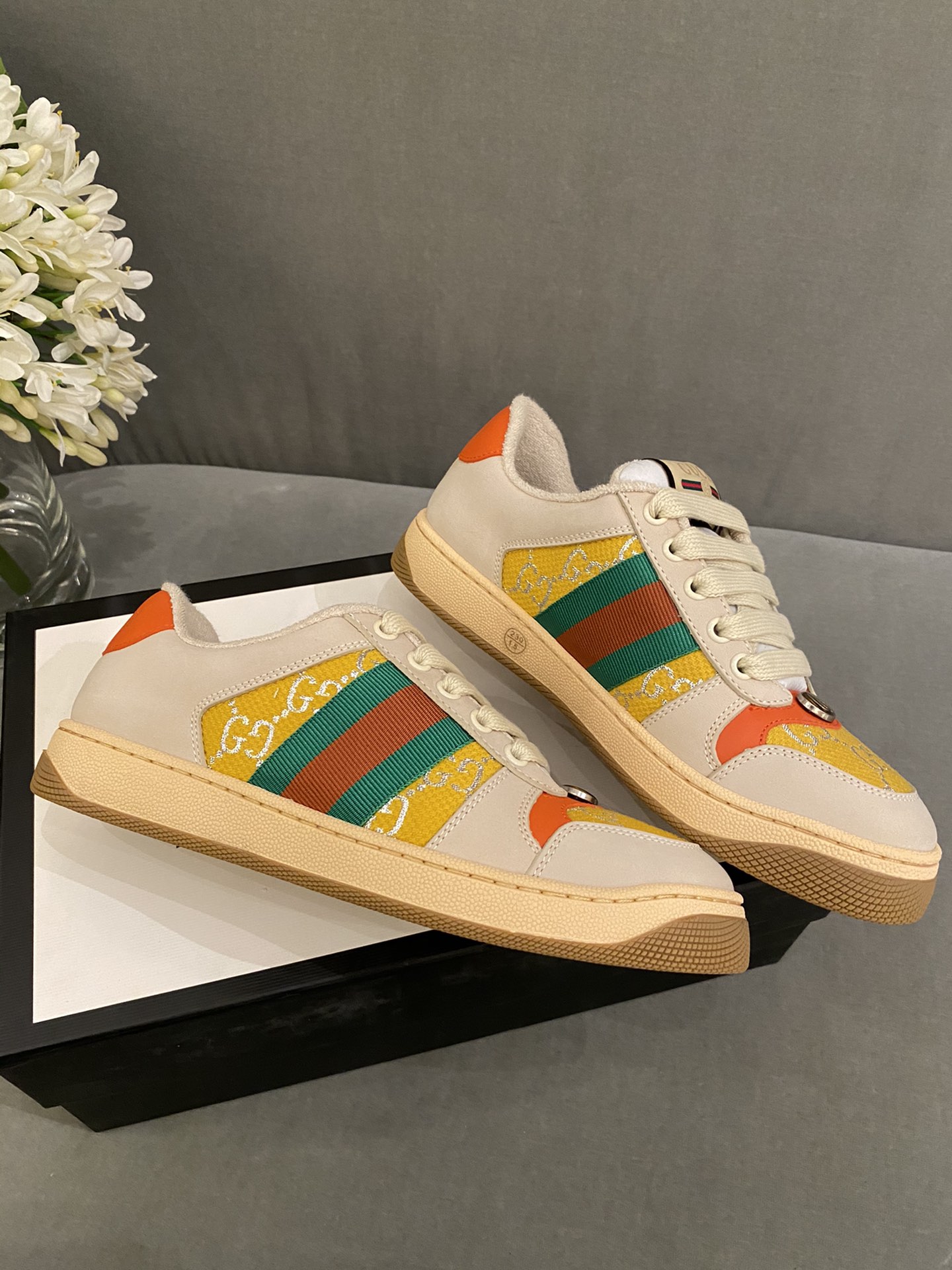 G*u*i sneakers