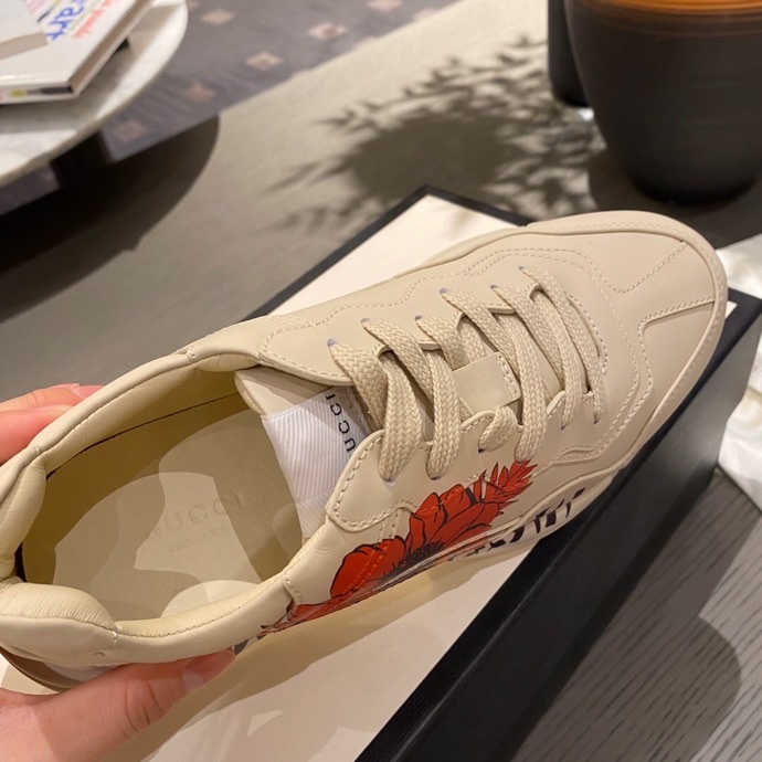 G*u*i sneakers