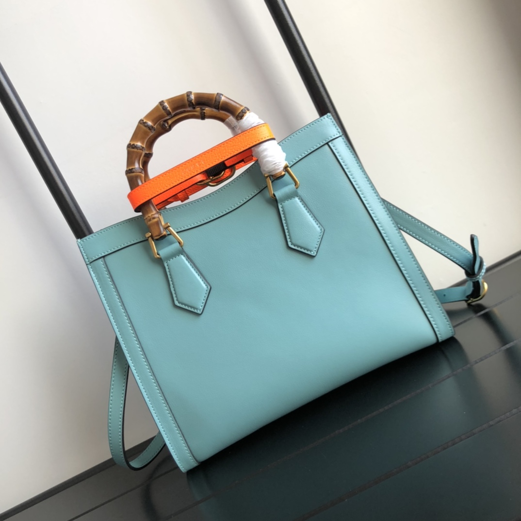 G*u*i diana top handbags