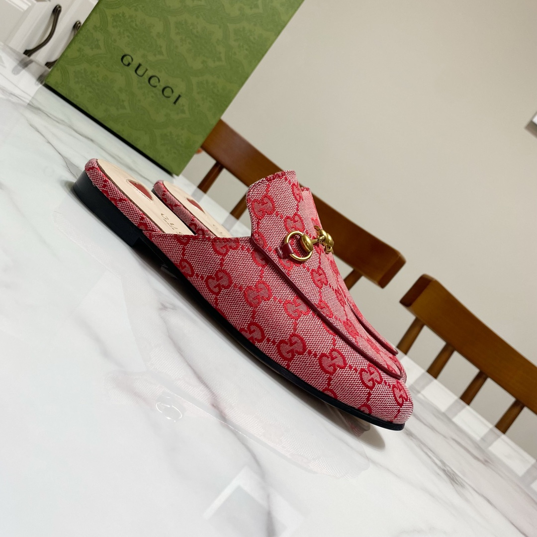 G*u*i loafers